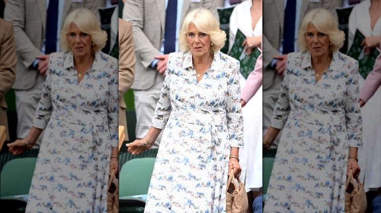 Queen Camilla walking in the seats at Wimbledon