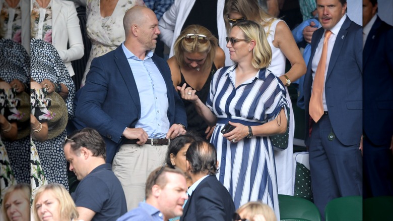 Mike and Zara Tindall talking at Wimbledon