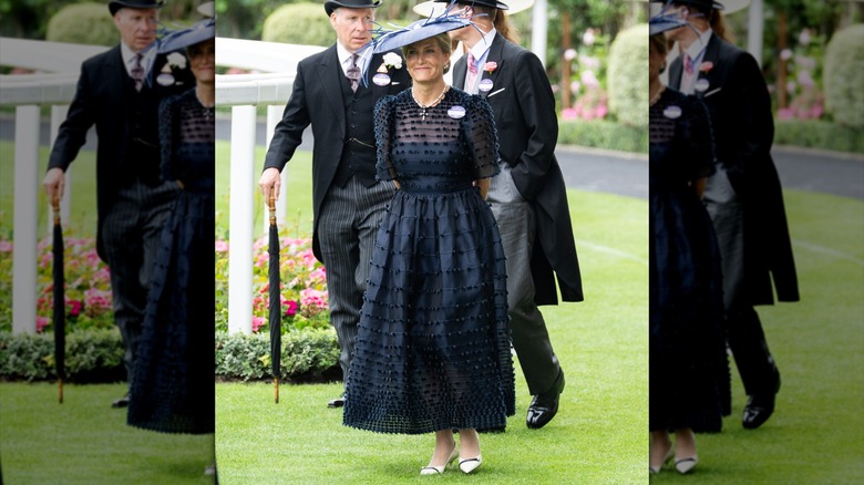 Sophie, Duchess of Edinburgh walking in a black dress and hat
