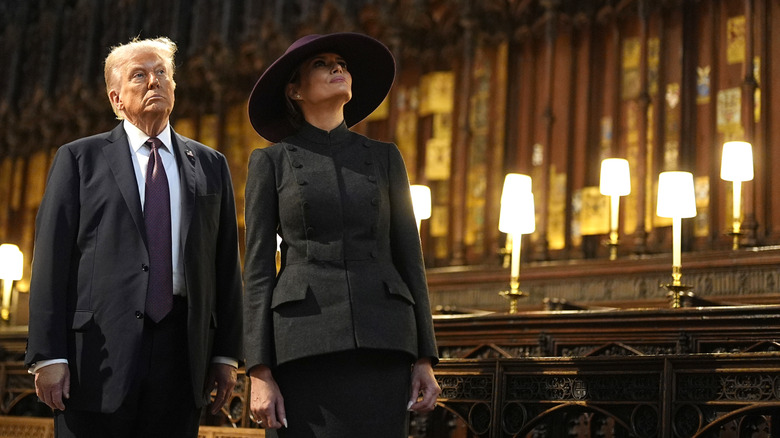 Donald and Melania Trump staring