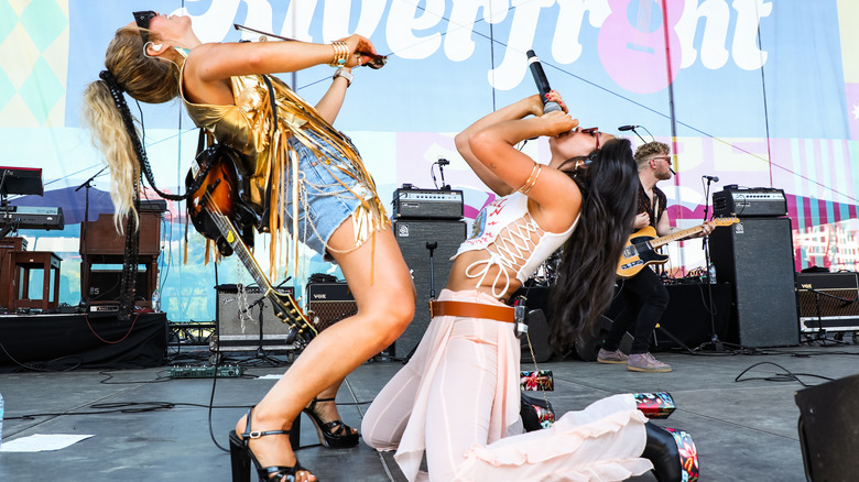Ill-dressed Runaway Jane performing wildly