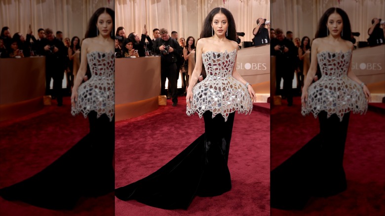 Chase Infiniti wearing a dress with a black velvet skirt and a mirrored bodice