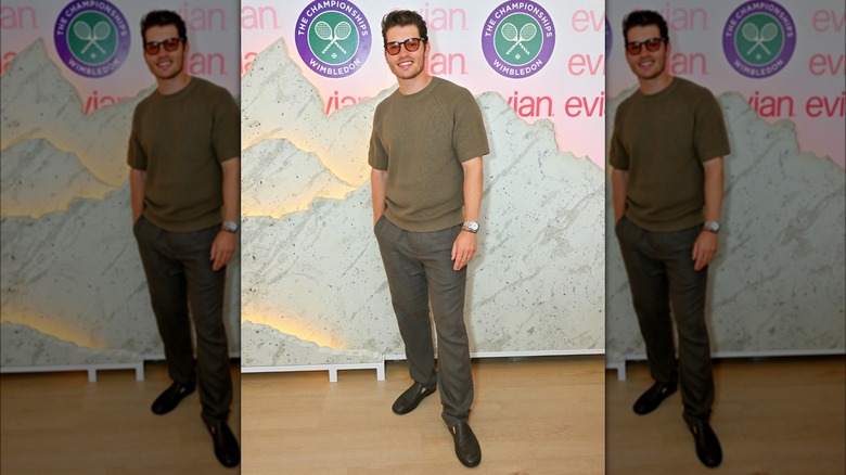 Gregg Sulkin posing