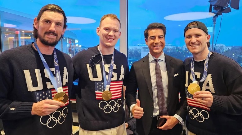 Jesse Watters smiles for photo with members of Olympic Team USA