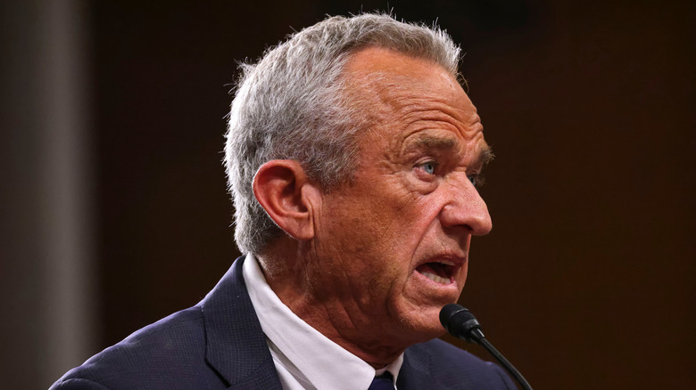 Robert F. Kennedy Jr. speaking into microphone at an event