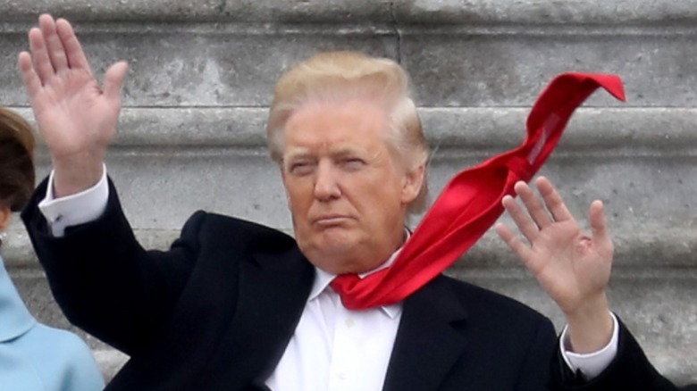 Donald Trump's red tie flying in the wind during his inauguration in 2017