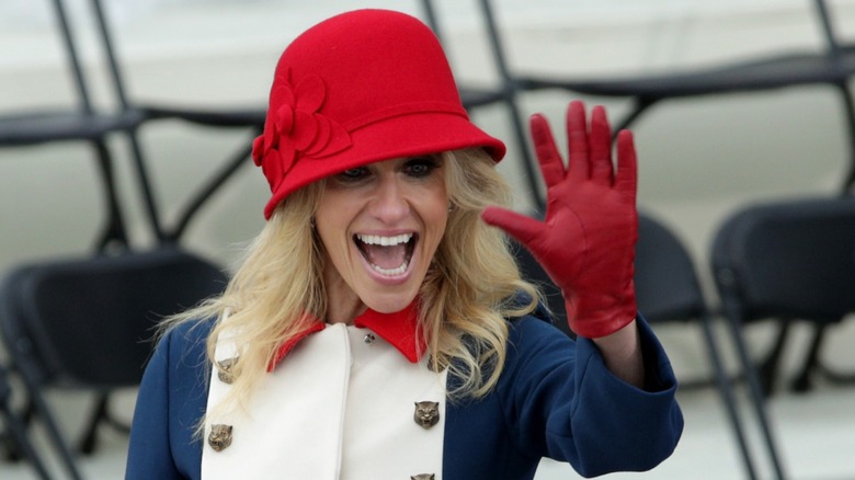 Kellyanne Conway smiling and waving at Donald Trump's inauguration in 2017