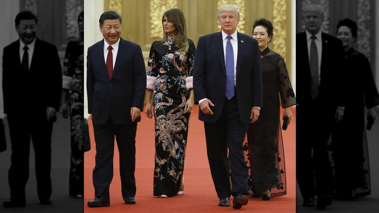 Xi Jinping, Melania Trump, Donald Trump, and Peng Liyuan walking together in November 2017