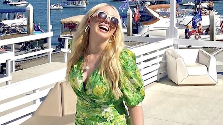 Tiffany Trump posing for a photo in a green dress in October 2020
