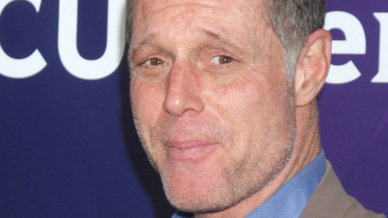 Jason Beghe looking to the side