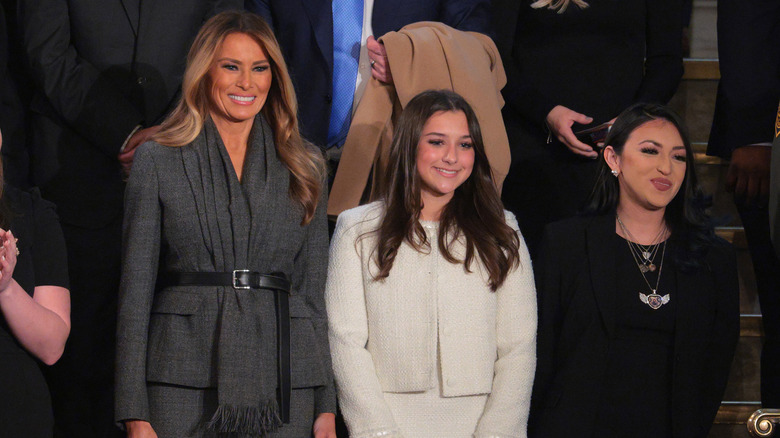 Melania Trump stands next to Elliston Berry and Alexis Nungaray
