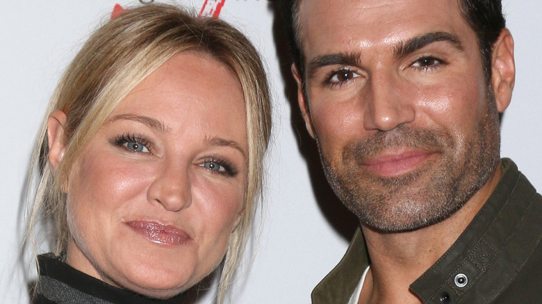 Sharon Case and Jordi Vilasuso smiling