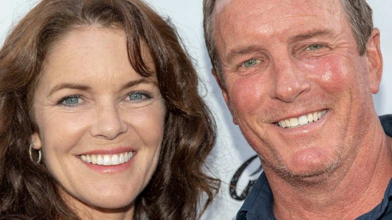 Susan Walters and Linden Ashby smiling