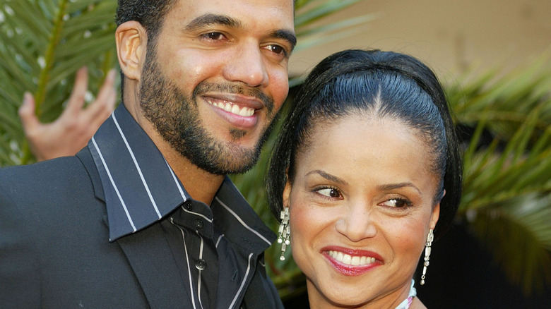 Kristoff St. John and Victoria Rowell smiling