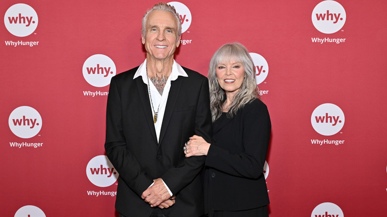 Pat Benatar posing with husband Neil Giraldo.