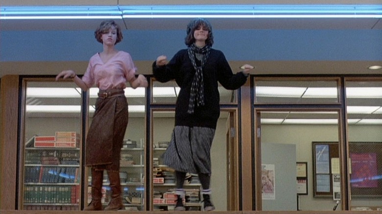 Molly Ringwald and Ally Sheedy dancing in The Breakfast Club