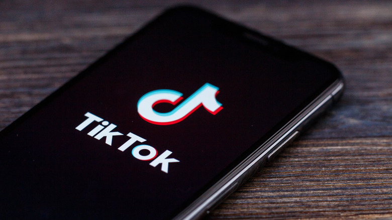 TikTok logo on phone