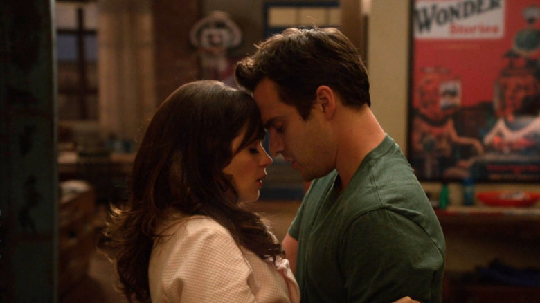 Nick and Jess smooching on New Girl