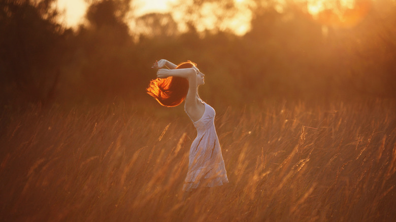 Woman wearing white sundresses on a summer day