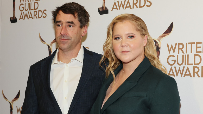 Amy Schumer and Chris Fischer attend an event