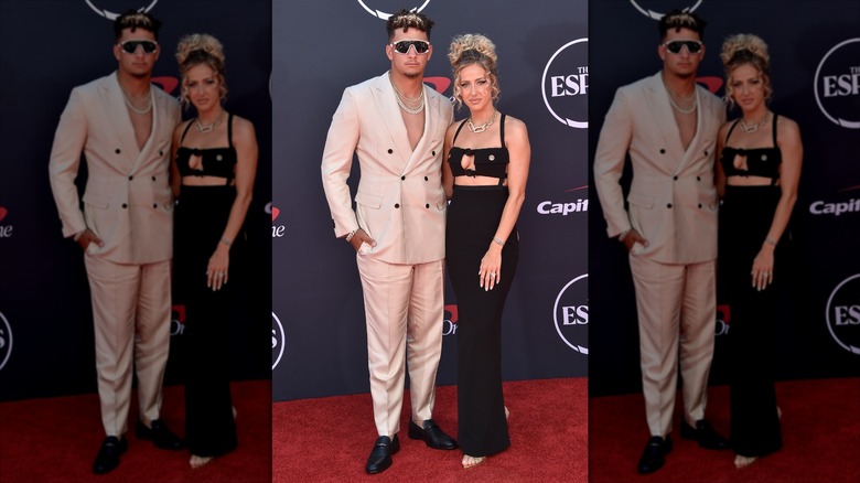 Patrick and Brittany Mahomes posing alongside each other at the ESPY red carpet in 2023