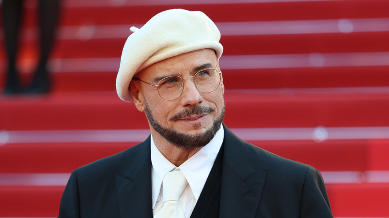 John Travolta wearing beret at Cannes Film Festival