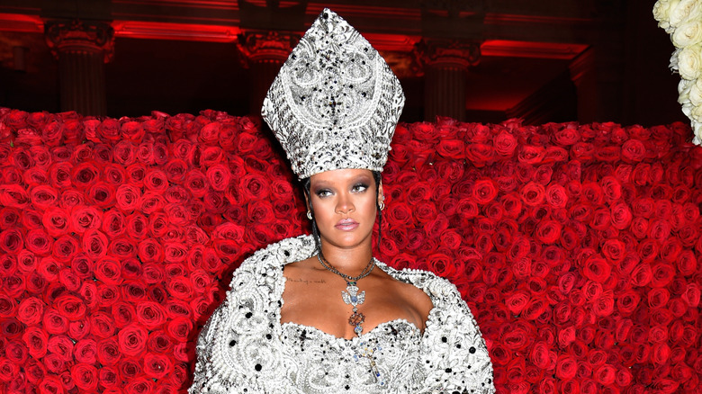 Rihanna at Met Gala in a pope hat