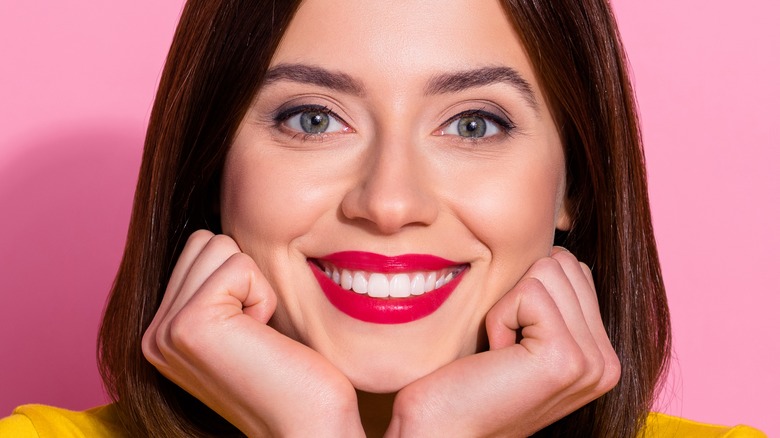 girl wearing a red lipstick