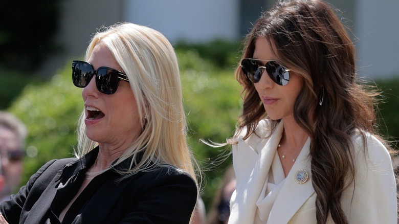 Pam Bondi and Kristi Noem greet guests in the Rose Garden of the White House (2025)
