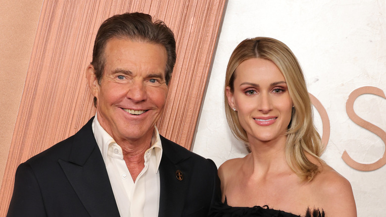 Dennis Quaid and Laura Savoie posing on red carpet