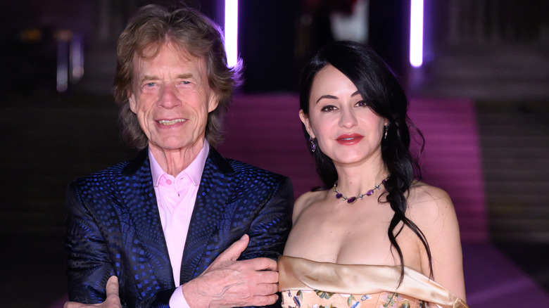 Mick Jagger and Melanie Hamrick posing on red carpet