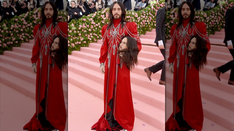 Jared Leto holding a mannequin of his head at Met Gala