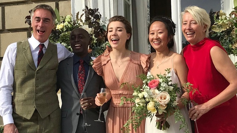 Tindyebwa Agaba Wise, second right, celebrating on his wedding day