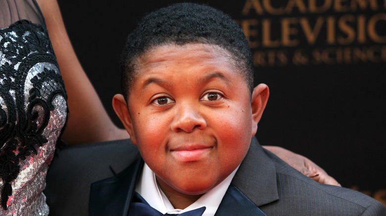 Emmanuel Lewis wearing a suit