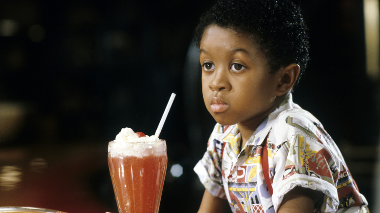 Emmanuel Lewis with a drink