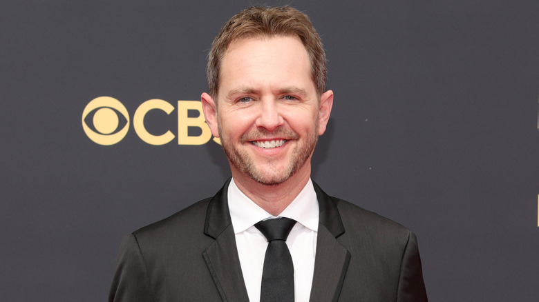 Matt Shakman wearing a suit and tie