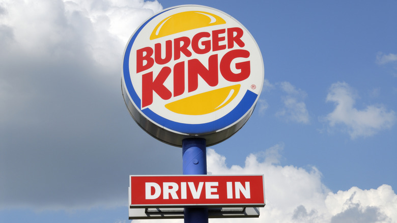 The sign for a Burger King drive in