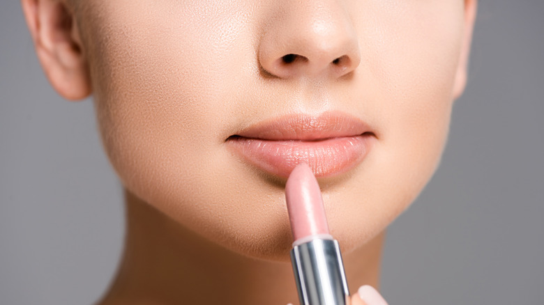 woman wearing makeup and dude lipstick