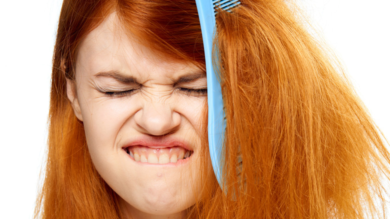 combing hair