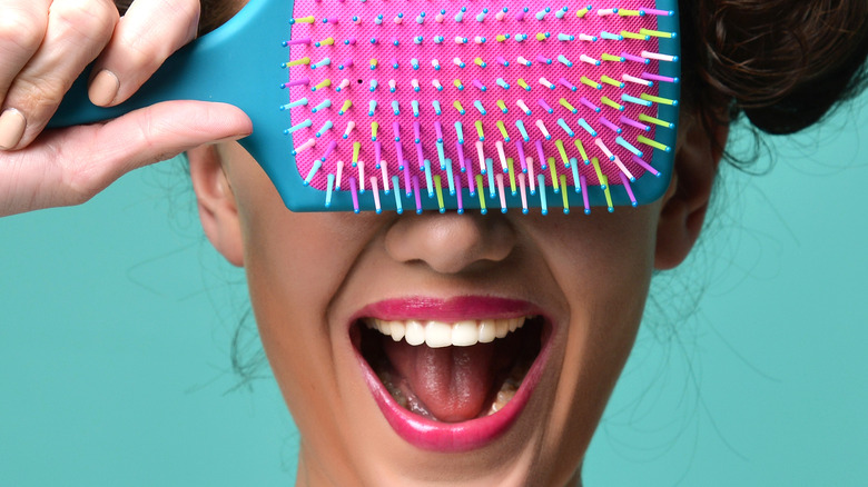 woman with hairbrush