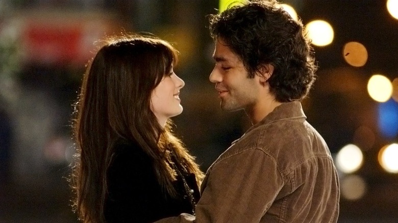 Anne Hathaway and Adrian Grenier in The Devil Wears Prada