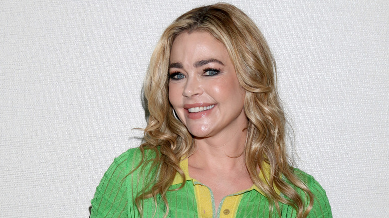 Denise Richards in green top