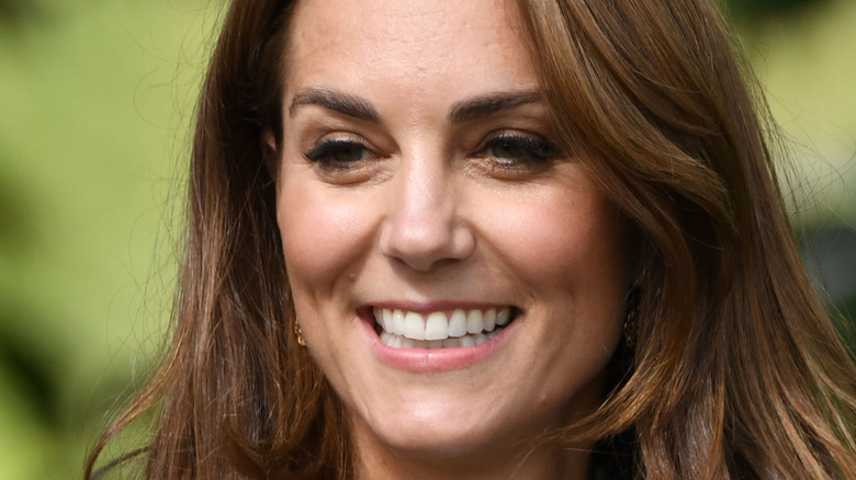 Kate Middleton smiling outside