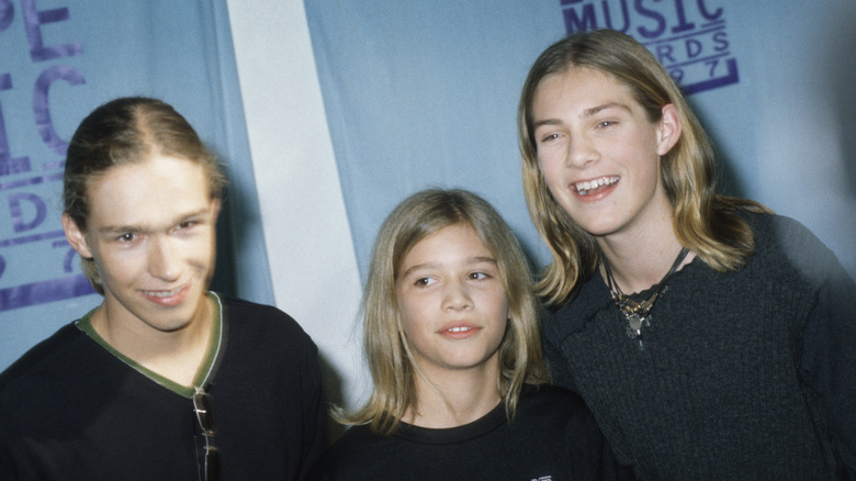 Hanson posing in the 90s 