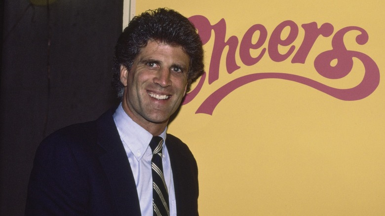 Ted Danson smiles in a photo on the "Cheers" set in 1990