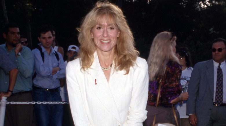 Smiling Judith Light posing for a red carpet photo circa the 1980s