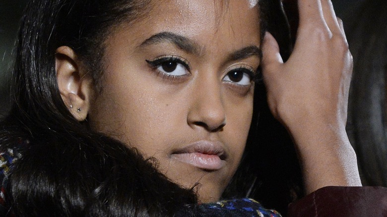 Malia Obama looking serious