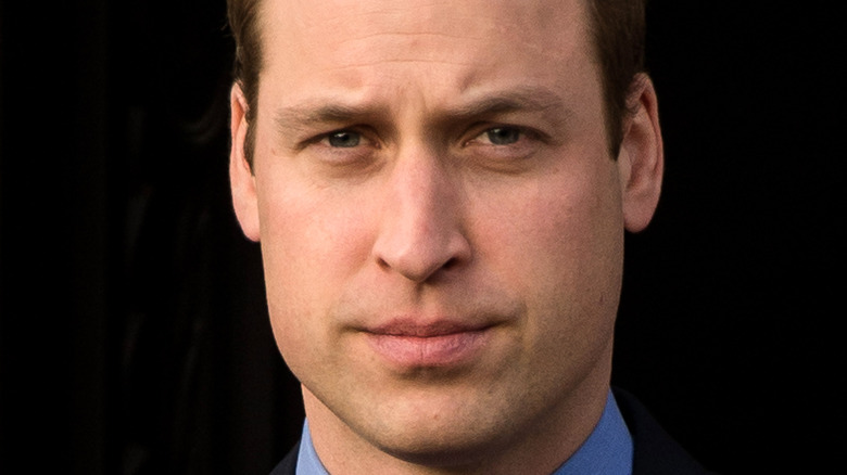 Prince William with a serious expression