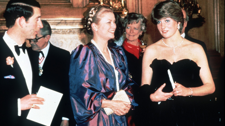 Princess Diana wearing a black dress to her first royal engagement with Prince Charles