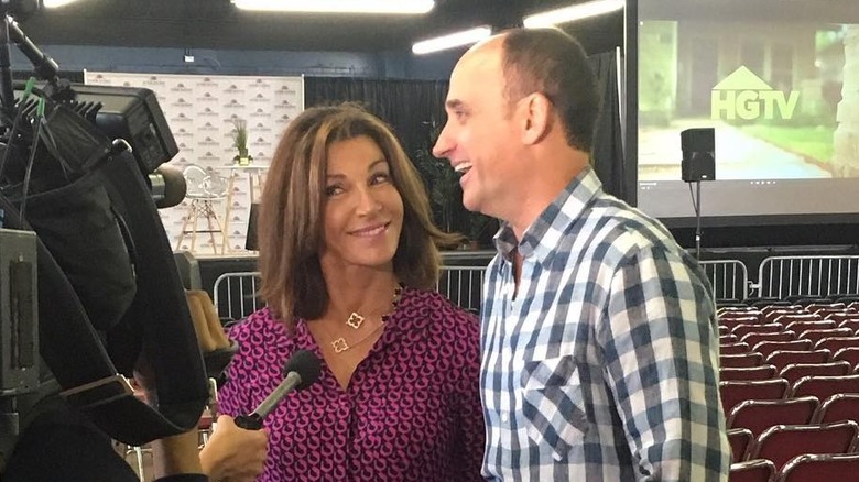 Hilary Farr and David Visentin filming